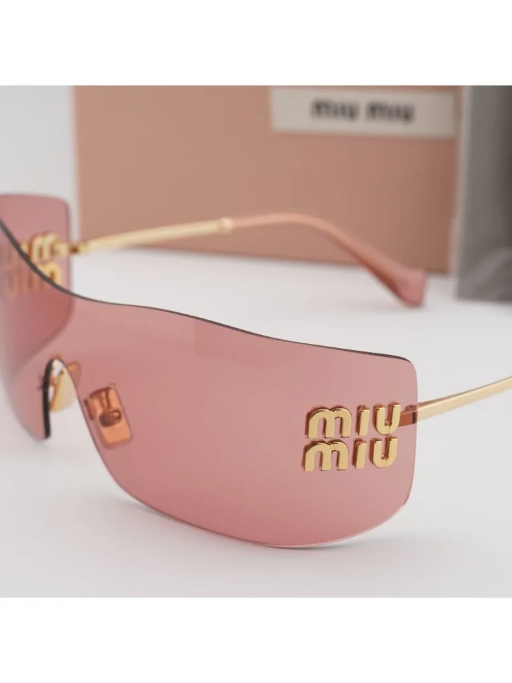 Miu Miu MUB53S 5AK20Y Rimless Shield Sunglasses – Gold / Red